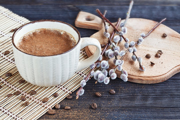 Cup of cappuccino with cinnamon