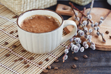 Cup of cappuccino with cinnamon