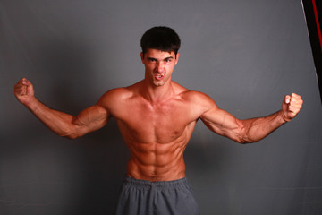 Fototapeta premium Athlete looks into the camera