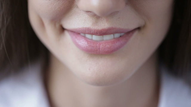 Beauty portrait, beautiful woman smiling at camera. White teeth