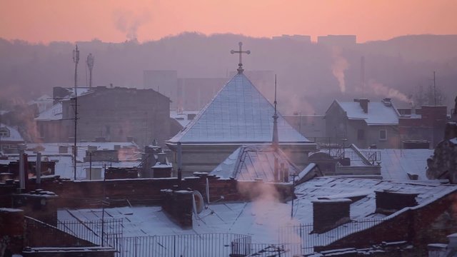 winter sunrise over the rooftops