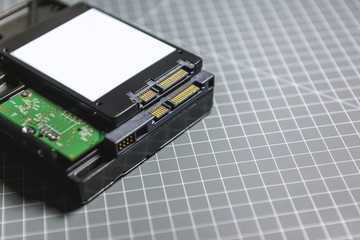 Fototapeta premium Ssd disk (solid state drive) above the HDD (hard disk drive)