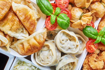 Asian snacks in white bowls