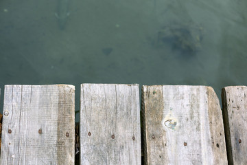 wood texture, showing texture of old hardwood with water in a fr