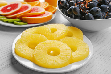 Fruits on light wooden background. healthy eating concept.