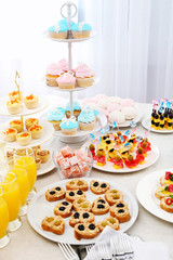 Set of cold snacks, canape, beverages and dessert, closeup