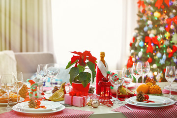 Christmas table setting on light room background