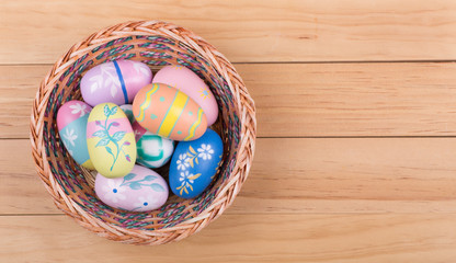 Assortment of Colorful Easter Eggs in a Basket