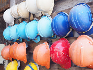 old colorful construction helmets