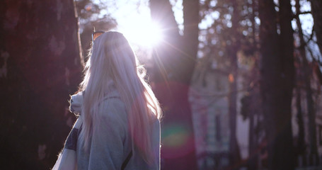 Beautiful blonde woman smiling to the camera