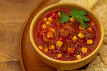Salsa with Corn and tortilla chips. Selective focus.