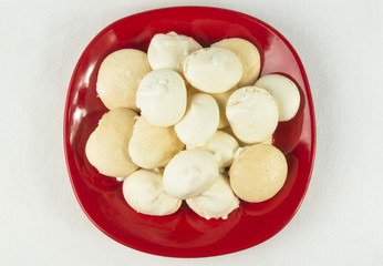 red plate with meringues