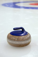 Curling Stone on ice - 102977051