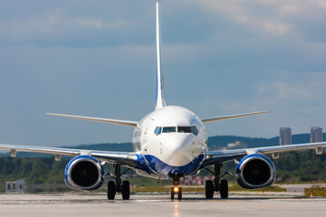 Fototapeta na wymiar Close up image of passenger airplane on the runway