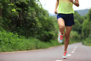 one young fitness woman runner running outdoor