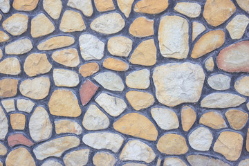 Pebble coating of a fence