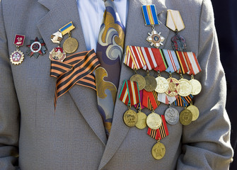 Orders and medals on his jacket