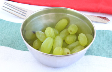 Healthy snack fresh, organic grapes in a bowl.