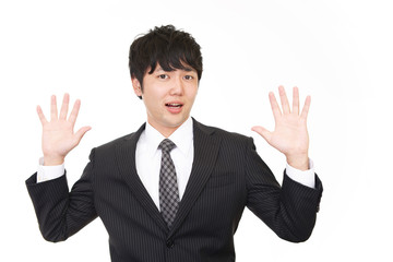 驚いた表情のビジネスマン