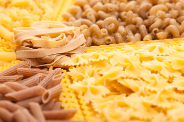 Assortment of italian pasta, five different varieties separated