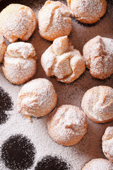 Italian street food: fried Castagnole close-up. vertical top view 
