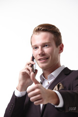 young businessman with a phone