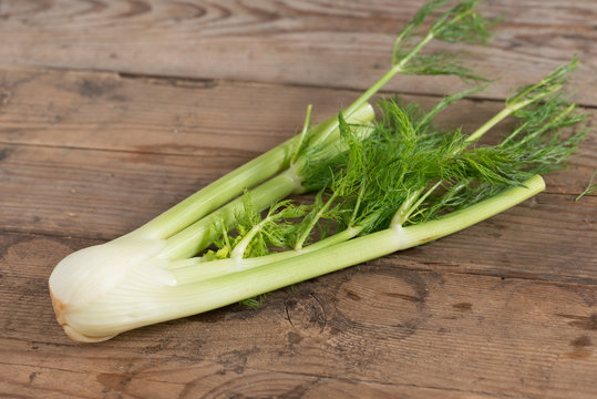 Fennel on wood background.