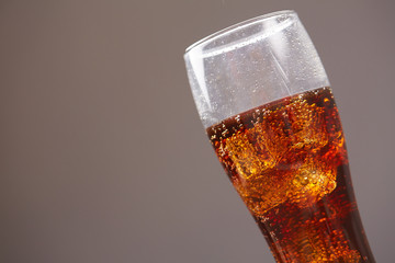 cola with ice closeup