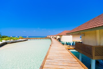 Fototapeta premium Maldives, bridge and bungalows