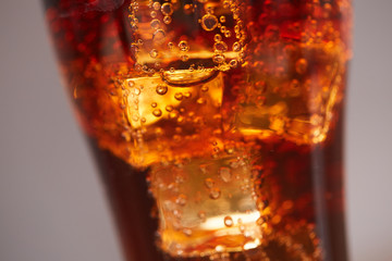 cola with ice closeup