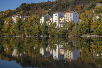 Fototapeta na wymiar Modern french houses reflect in the river in Europe