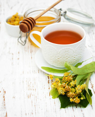 cup of herbal tea with linden flowers