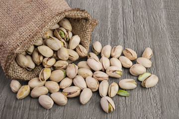 Pistachios on wooden table