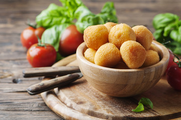 Traditional italian fried balls of mozzarella