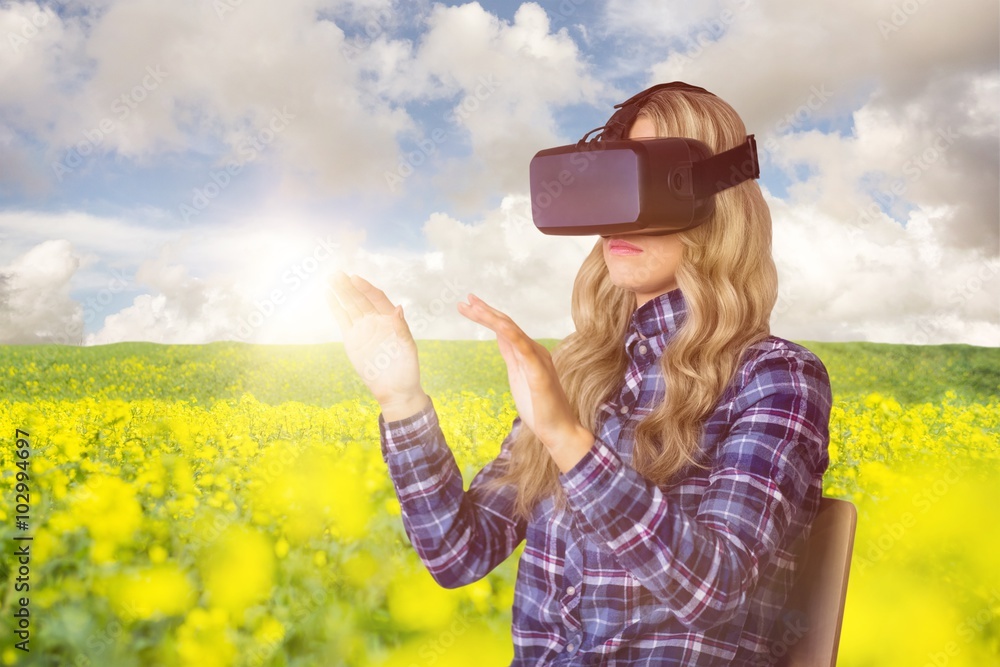 Poster composite image of pretty casual worker using oculus rift