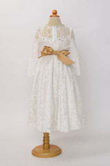 Baby white dress on a mannequin