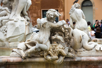 Fototapeta na wymiar Piazza Navona Fountain of Neptun. Designed by Giacomo della Porta (1574) and Antonio della Bitta. Rome, Italy