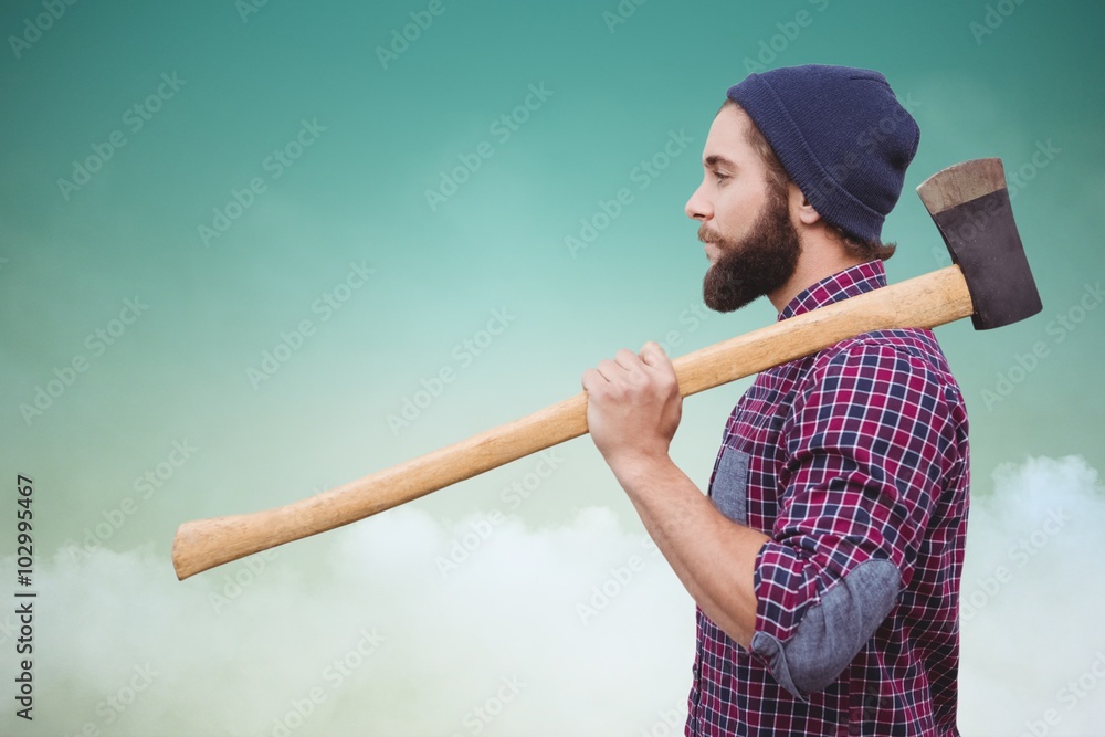 Poster composite image of side view of hipster with axe on shoulder