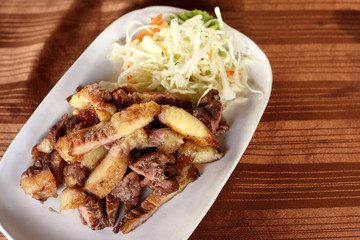 Charcoal-boiled pork neck.
