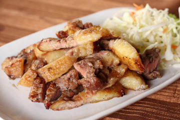 Charcoal-boiled pork neck.