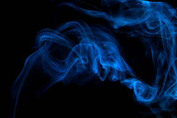 Blue smoke on black background
