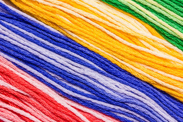 Colorful floss macro background.
