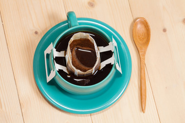 Drip bag fresh coffee in cup