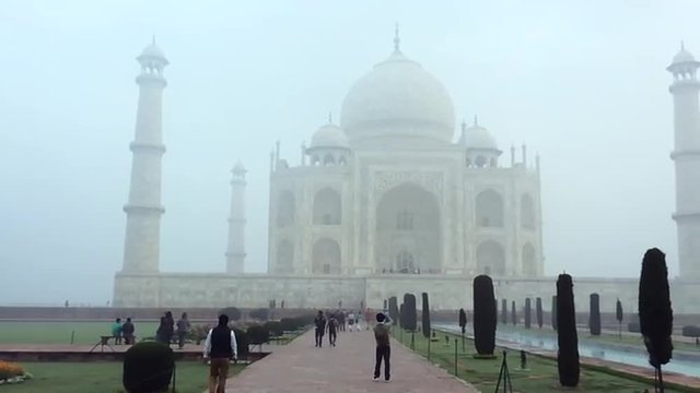 Pan shot of tourists at Taj Mahal, Agra, Uttar Pradesh, India