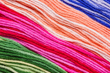 Colorful linen ropes macro background.