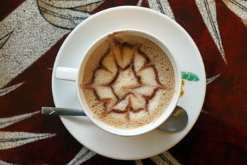 Vietnamese cafe. Traditional coffee cup on the table