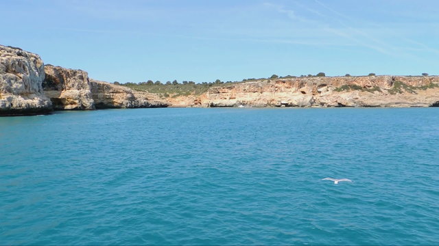 The East Coast of Majorca Island - Red Cliffs, Caves, Small Bays And Emerald Sea