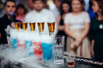 A bar with a selection of cocktails