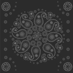 Black background with a paisley ornament. Circular ornament. Vector pattern