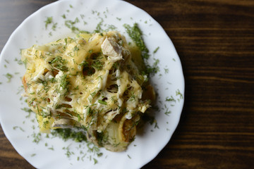 baked potato with chicken and cheese